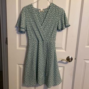 Light green and white flower dress with a tie on the side